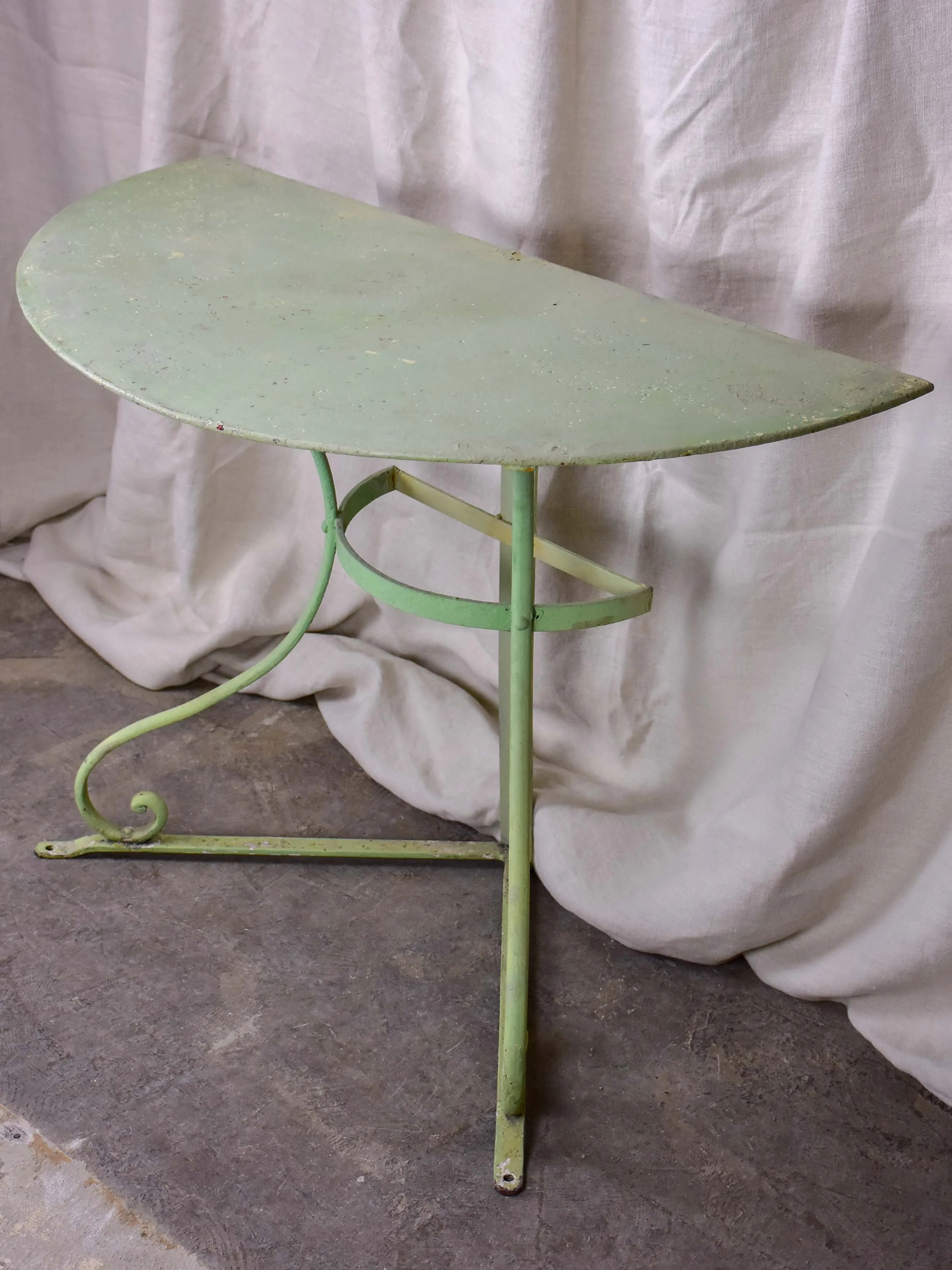 Pair of antique French half-moon garden tables